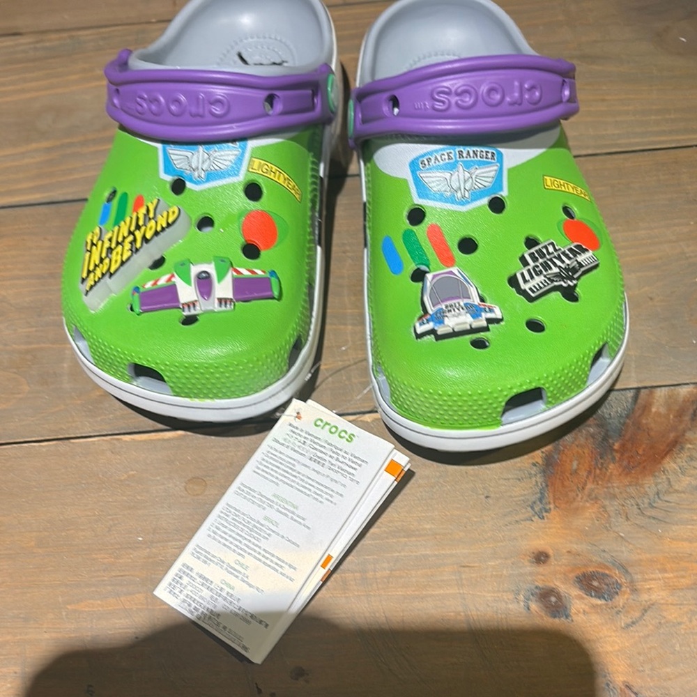 New with tags Crocs Kids Green and Purple Clogs